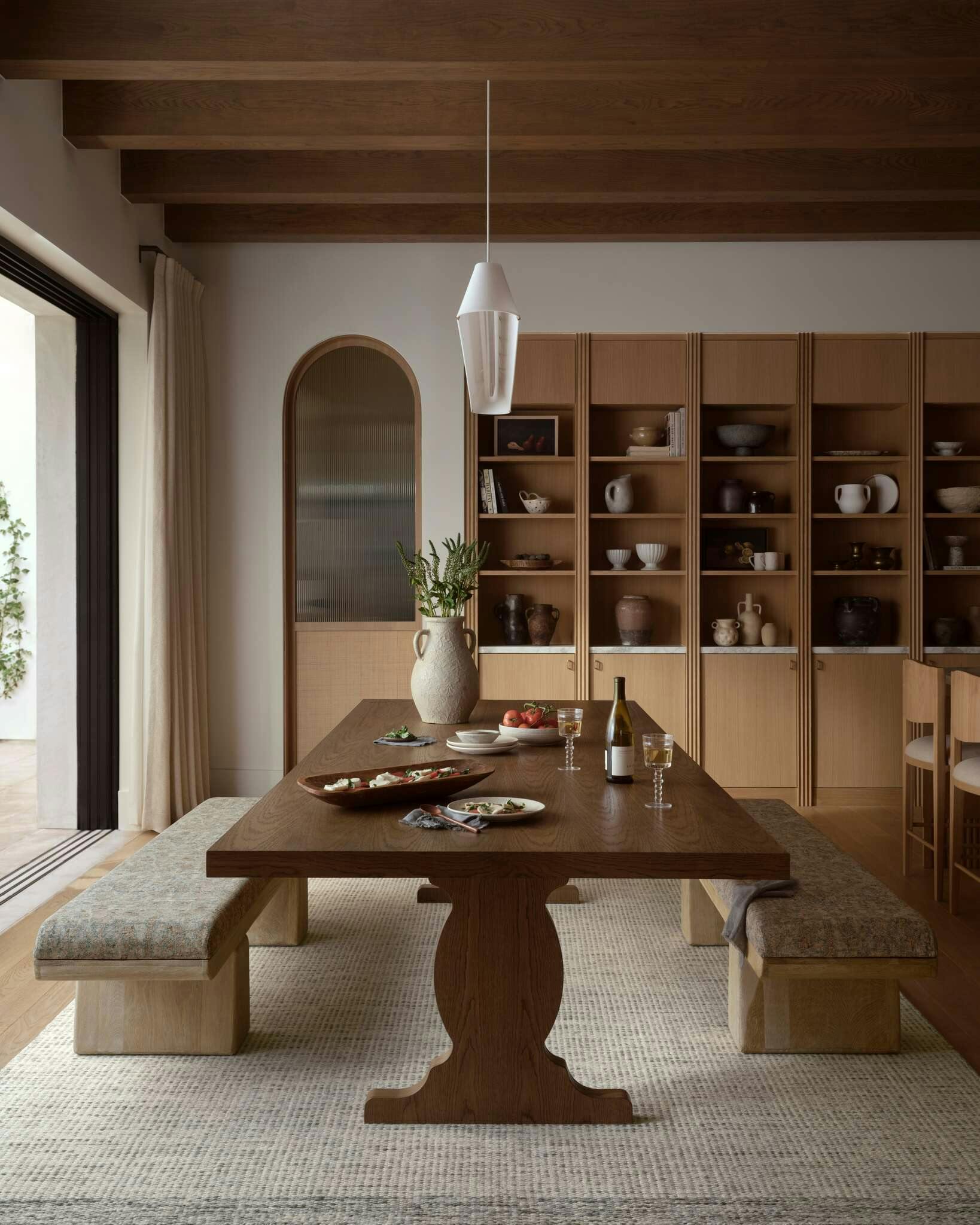 Dining space featuring Kaden bench and Orla Rug
