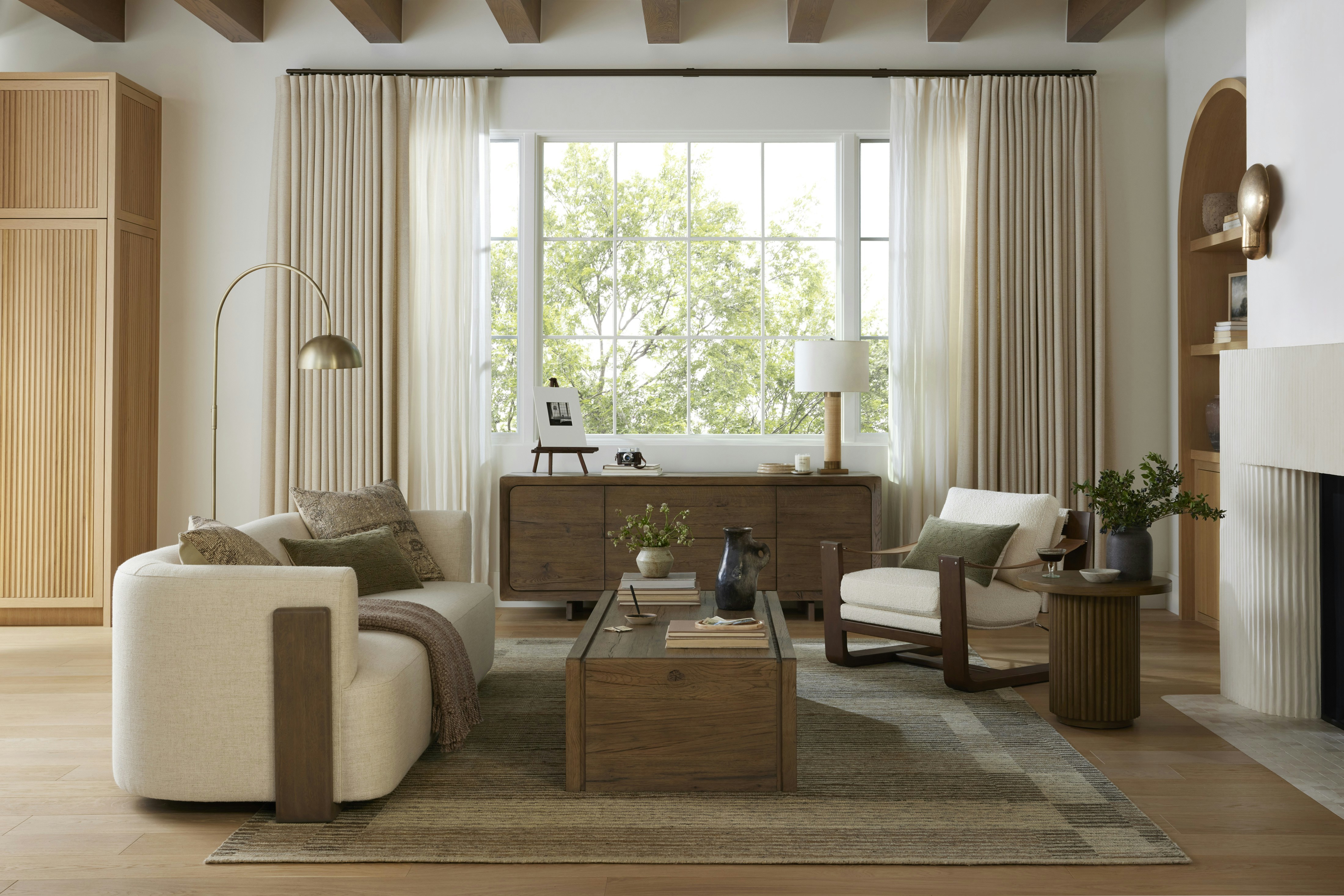 Living room shot featuring Hudson Cradle Sofa, Cassius Sling Chair, Hargrove Coffee Table and Anala Rug