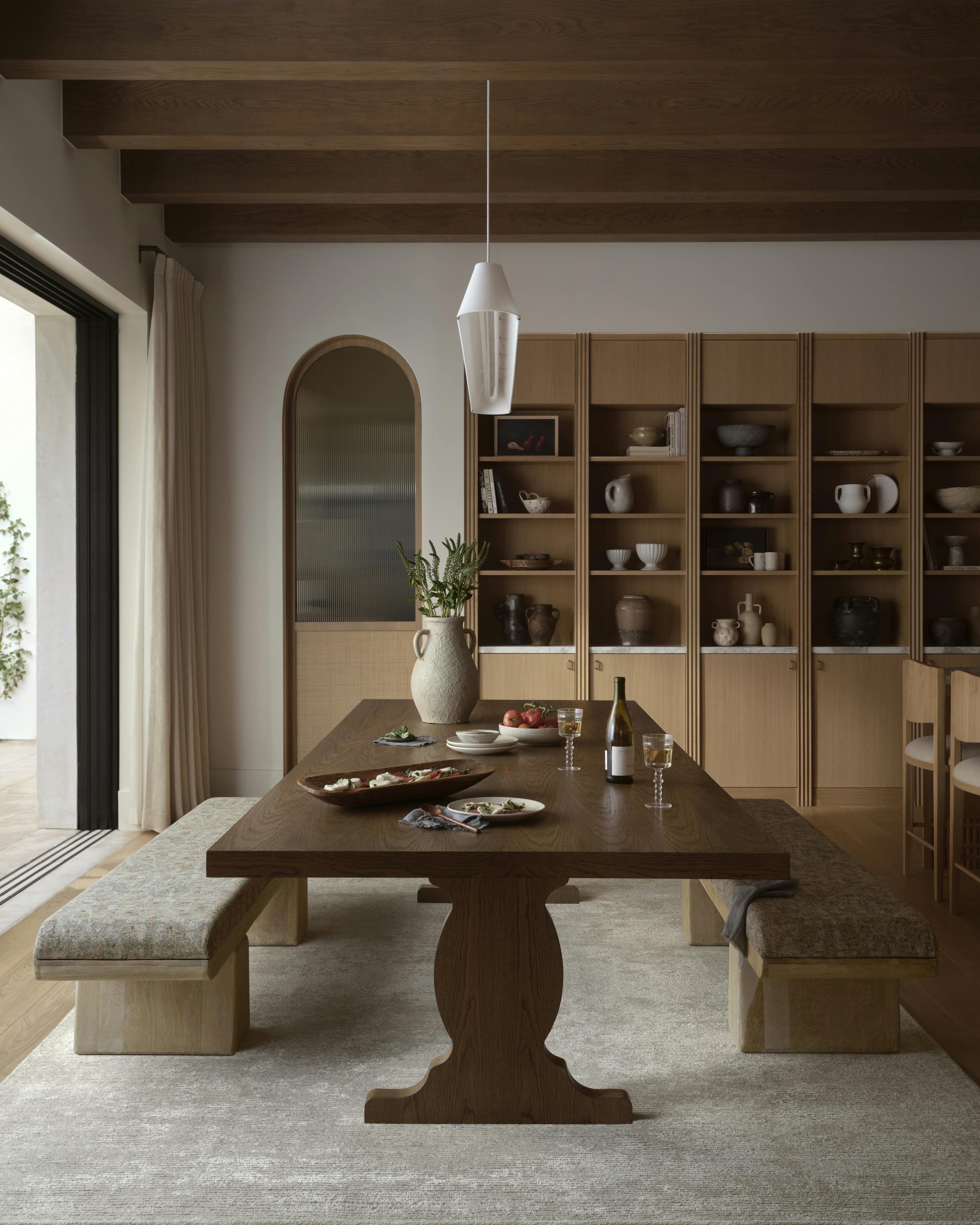 Dining space featuring Kaden bench and Sapna Rug