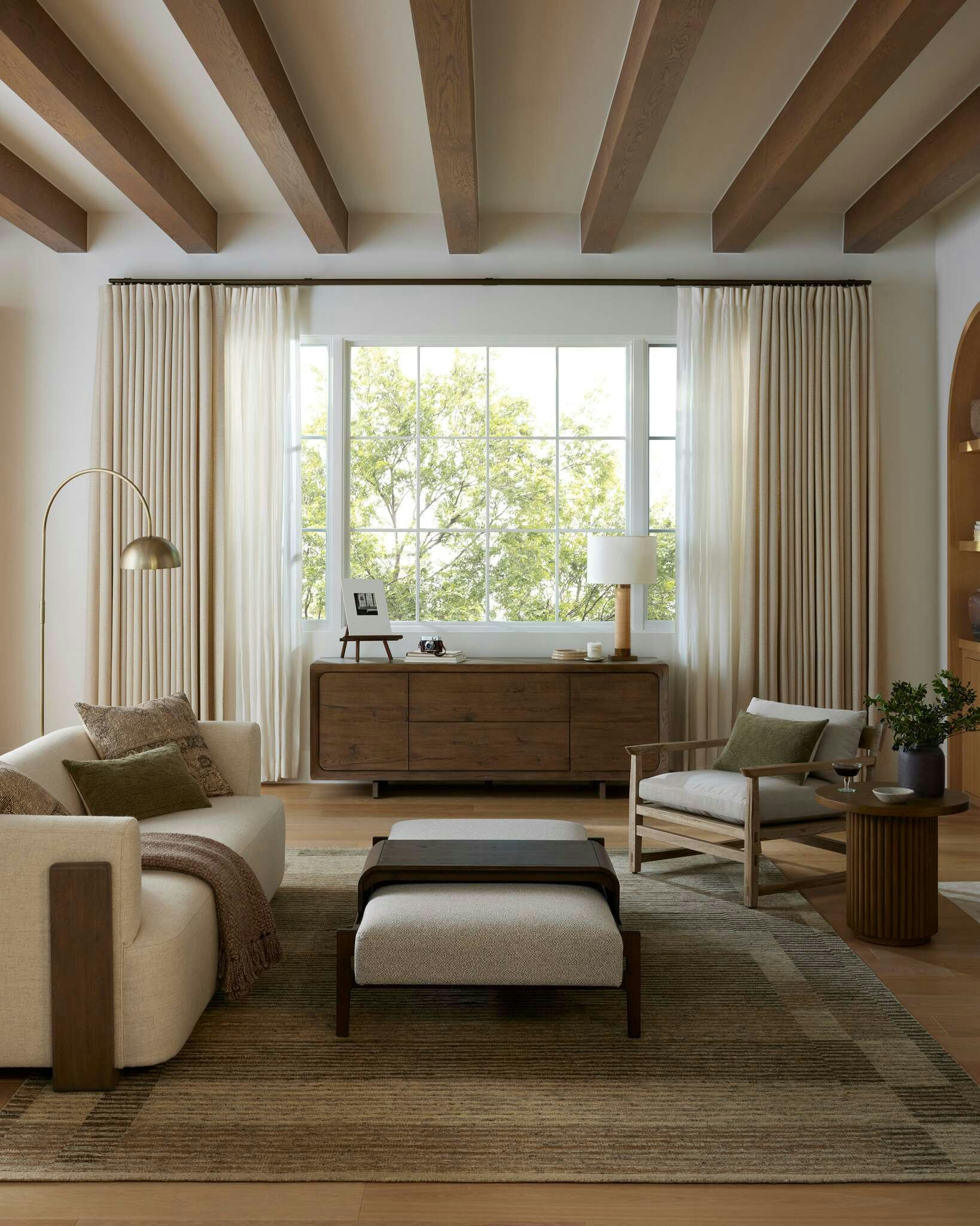 Living room shot featuring Hudson Cradle Sofa, Cassius Sling Chair, Hargrove Coffee Table and Anala Rug