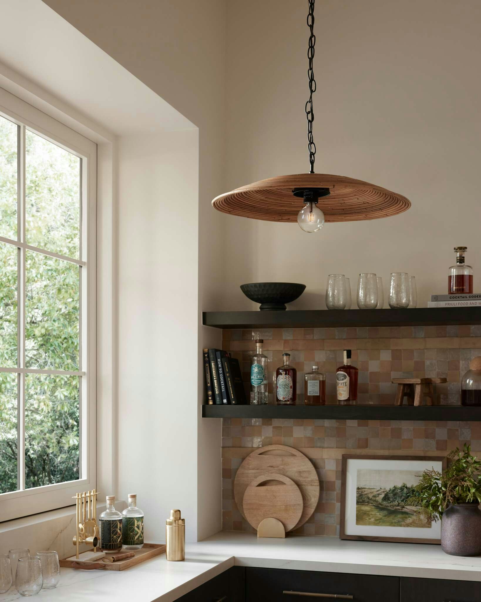 Kitchen countertop featuring Nuri pendant light and Countryside Scenery Artwork
