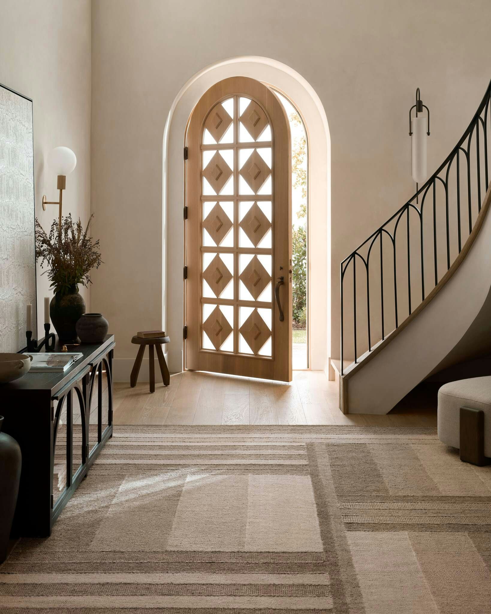 Entryway featuring Sonia Rug