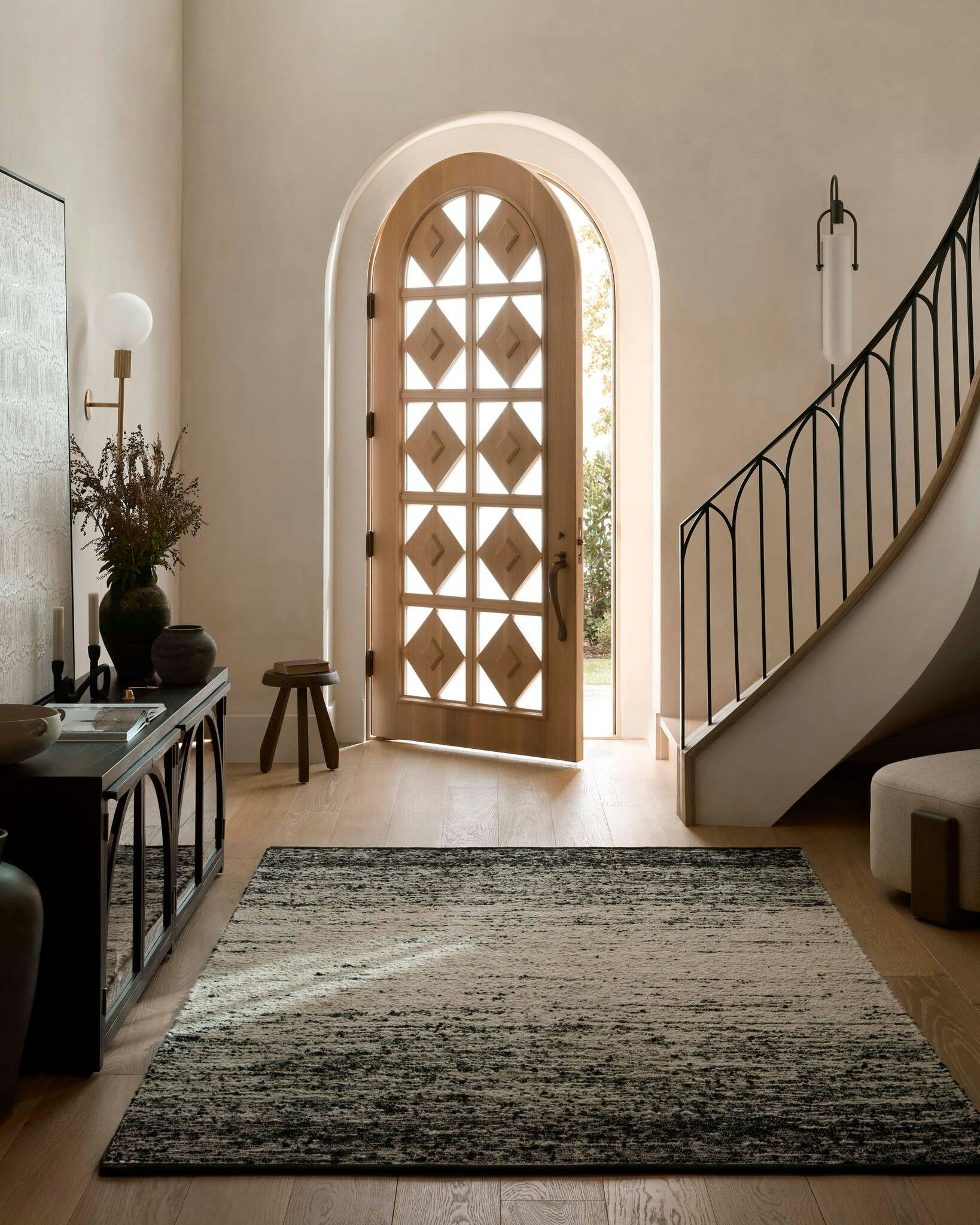 Entryway featuring Darrin rug