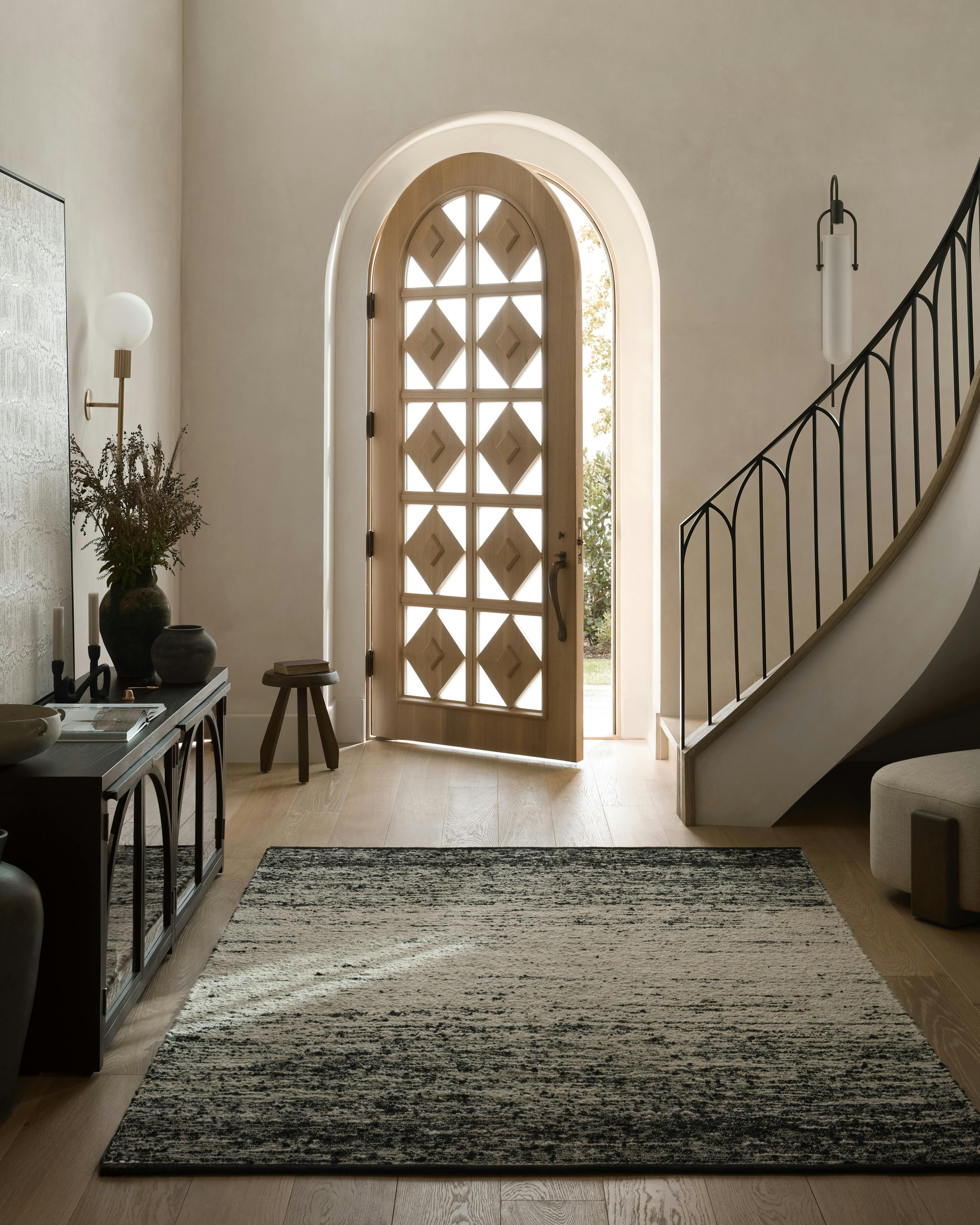 Entryway featuring Darrin rug